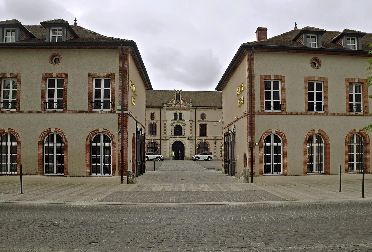 The courtyard and paired entrance buildings of Champagne Boizel in Épernay