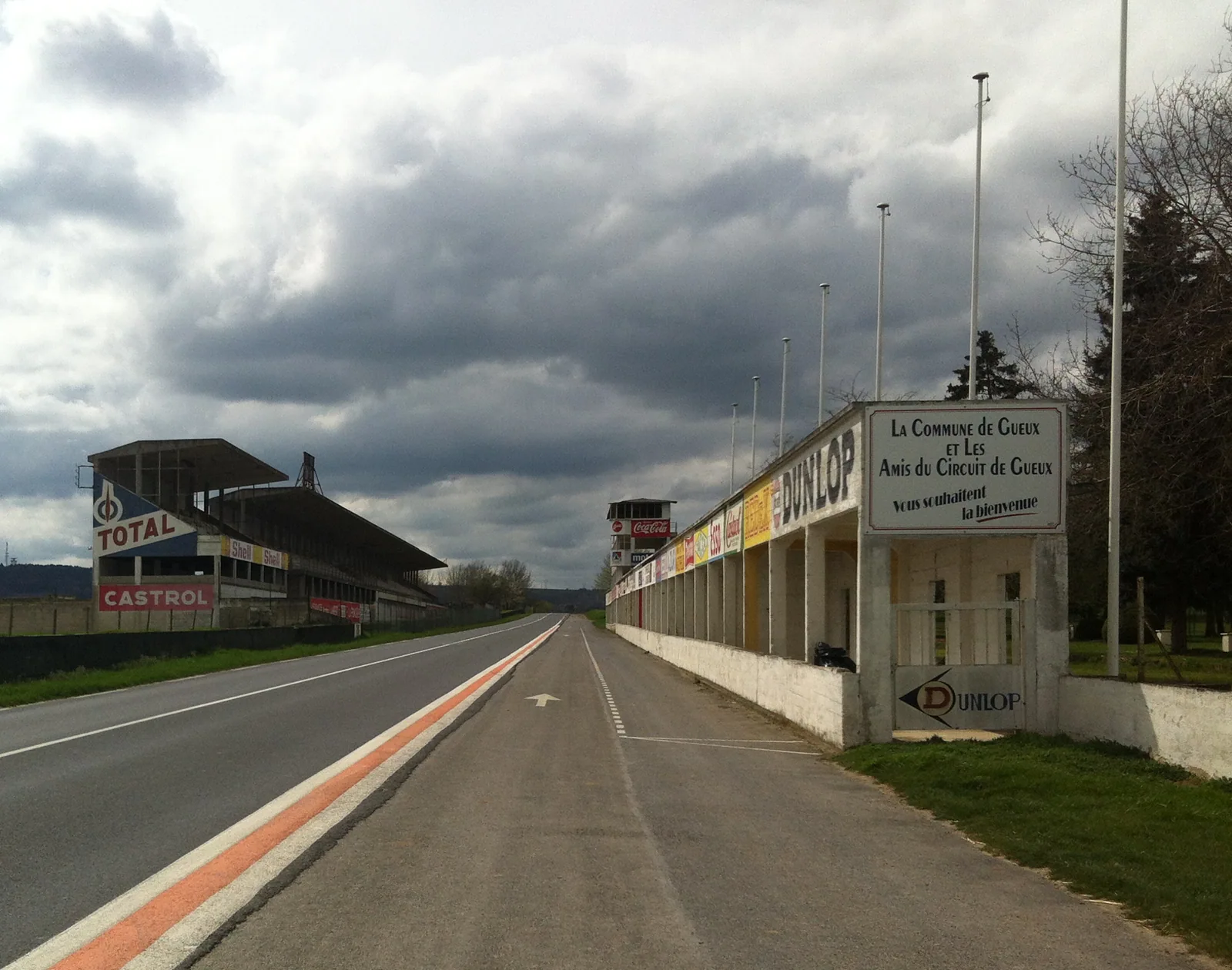 Tvx1 — CC BY-SA 4.0 Preserved pit buildings and grandstands at Reims-Gueux, photographed in April 2016